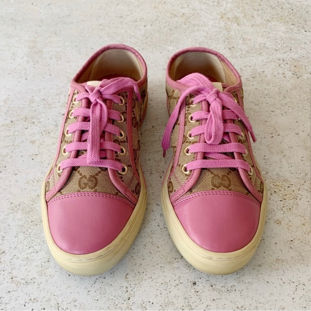 Gucci monogram logo sneakers.